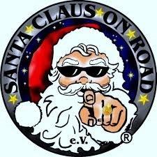 Das Bild zeigt eine humorvolle Zeichnung von Santa Claus als "Christmas Biker".